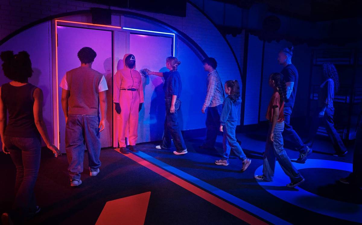 Squid Game Experience - Bunker with people about to go through the door