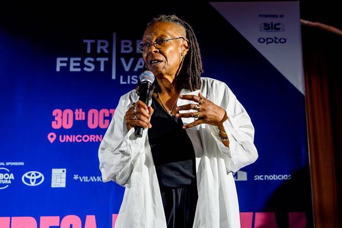 Whoopi Goldberg speaking at an event