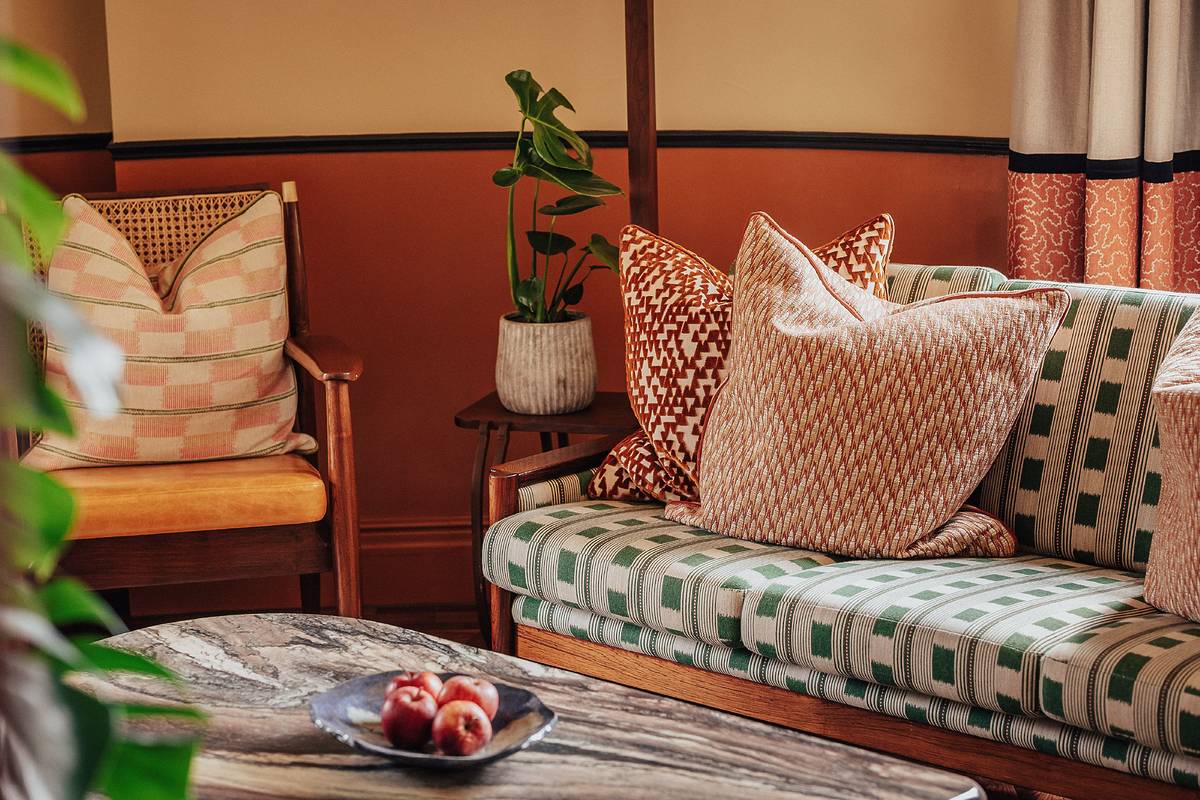 A sofa and coffee table inside the new Permit Hall Lodgings