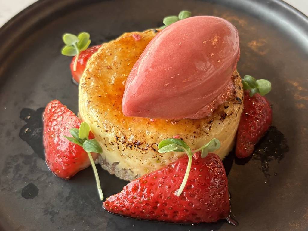 White chocolate creme brulee with strawberry and basil at Escapade's restaurant, The Gallery.