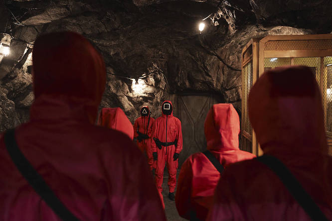 Squid Game characters in the Squid Game experience