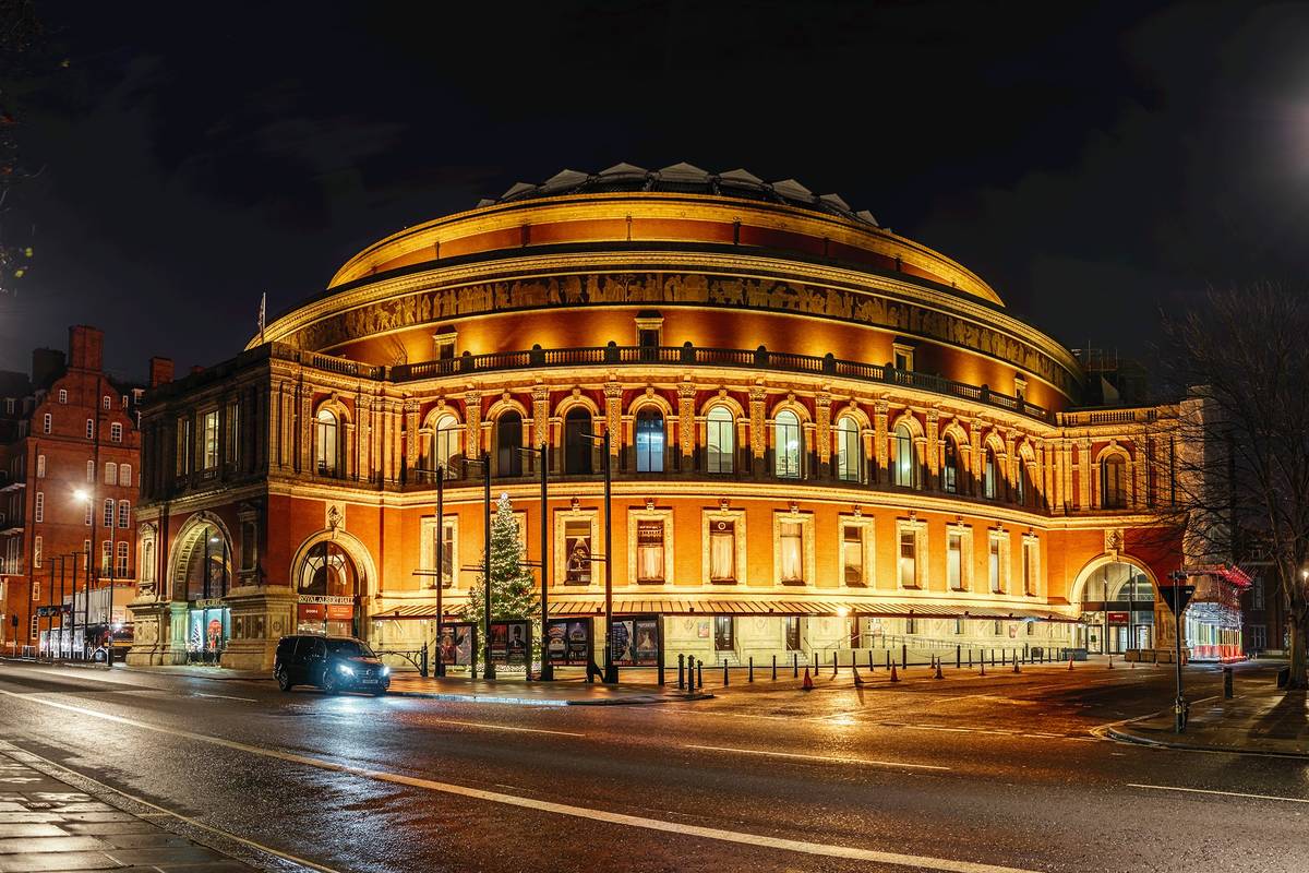 old building lit up with a dome