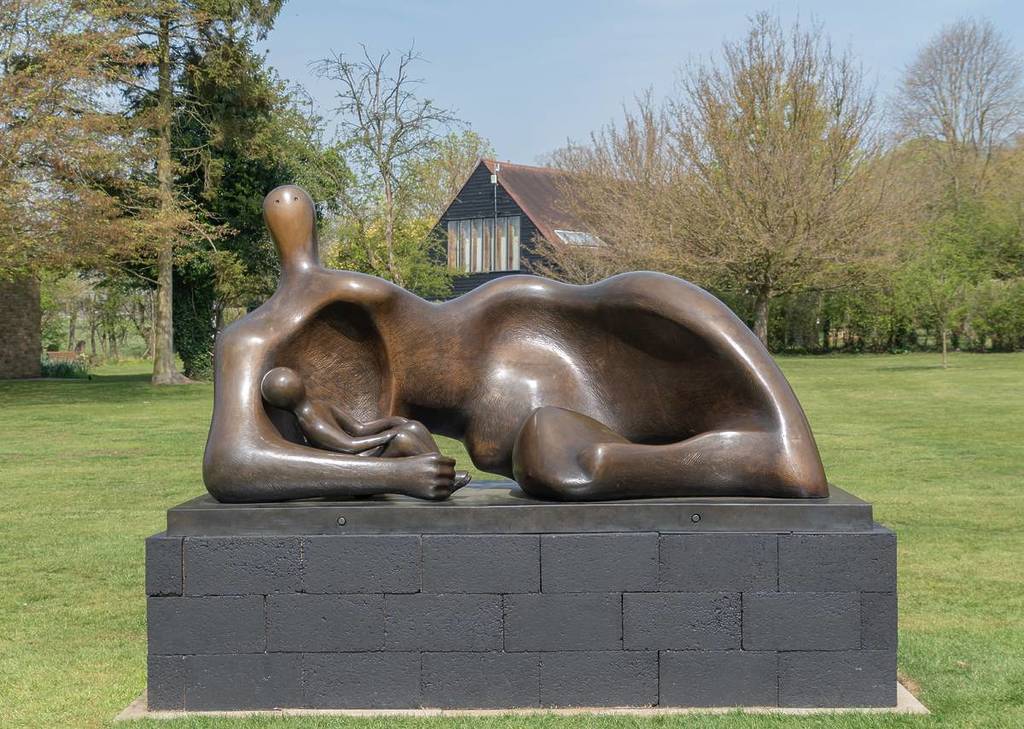 Henry Moore’s former home, Studios and gardens in Hertfordshire. The gardens showcase Moore's iconic sculptures. Draped Reclining Mother and Baby.