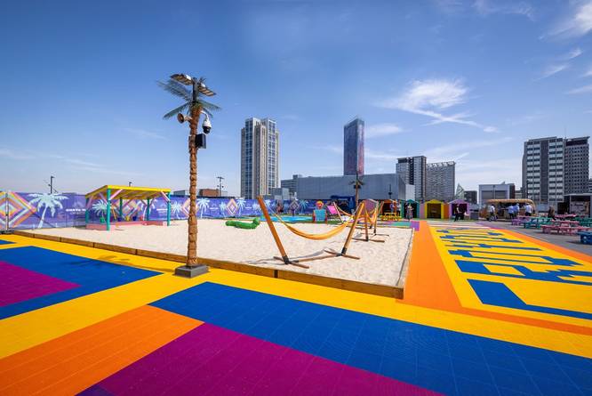 Costa Del Croydon beach with a multi-coloured surrounding