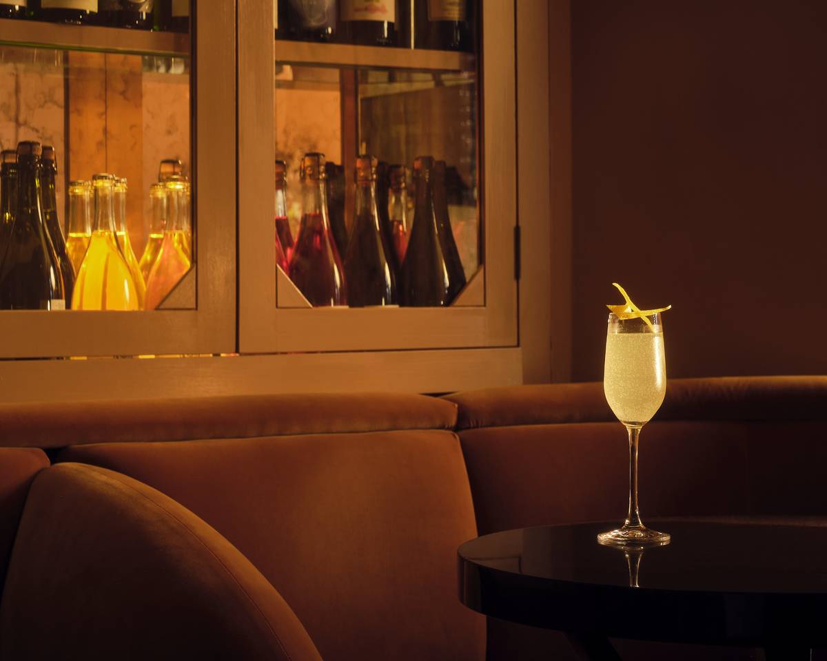 A cocktail perched on a table inside The Mulwray wine bar