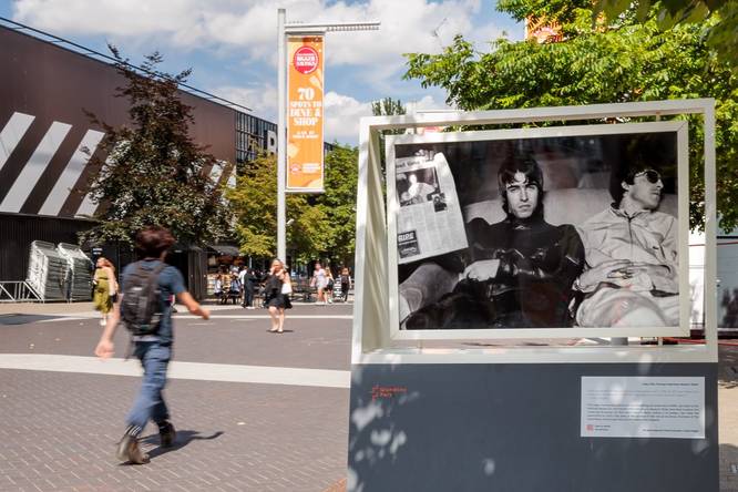 Oasis photographed in 1994 ahead of Definitely Maybe. The photograph is displayed outside of