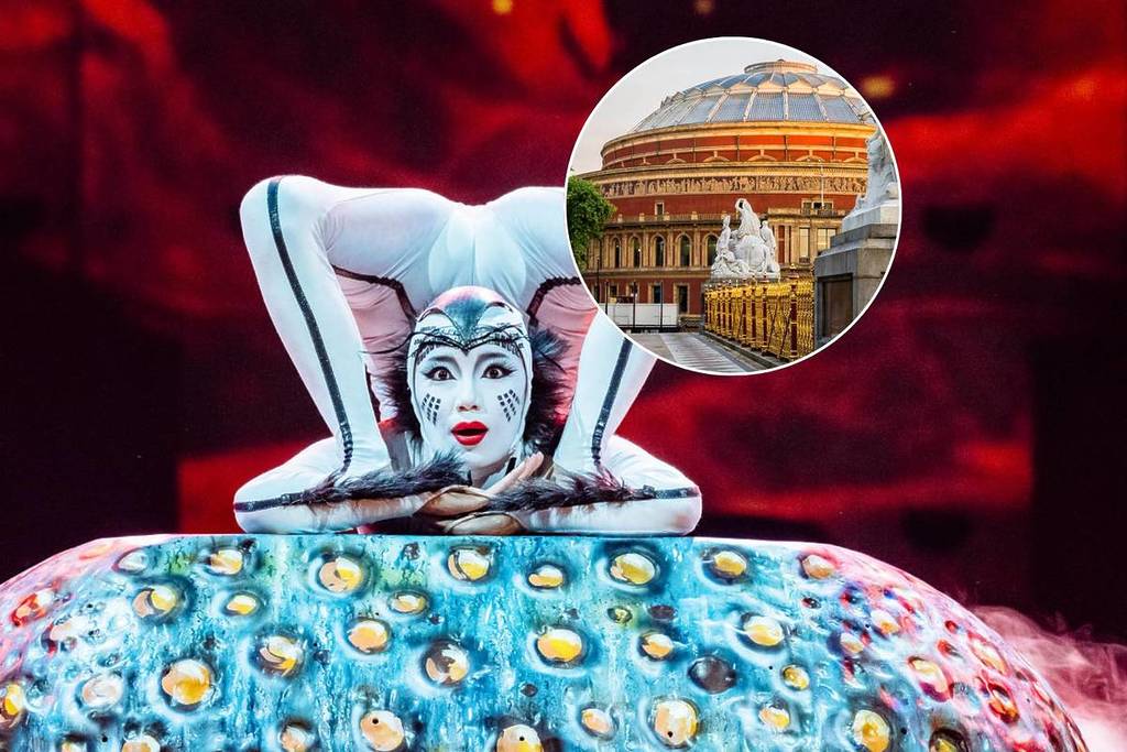 Circusartiest die een truc van Cirque du Soleil uitvoert en de buitenkant van de Royal Albert Hall.