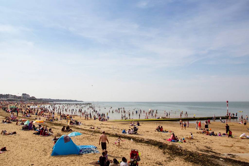 MARGATE, KENT, UK - AUGUST 28, 2017. A busy Margate beach packed with tourists. Margate, Kent, UK, August 28, 2017