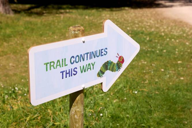 A sign along the 'Very Hungry Caterpillar' trail