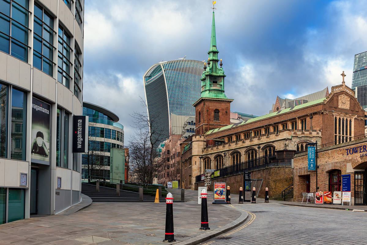 Street view of All Hallows-By-The-Tower church with the Walkie Talkie building behind it.