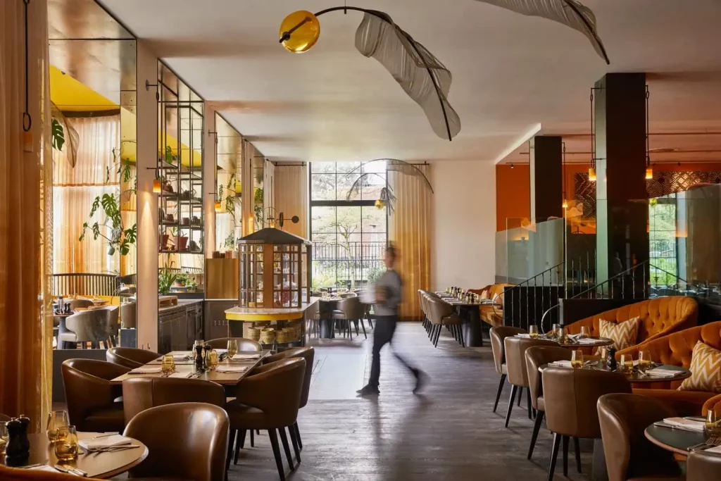 the interior of The Grove's Glasshouse restaurant