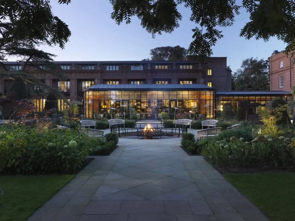 The exterior of The Grove's Glasshouse restaurant, taken from the hotel's picturesque gardens