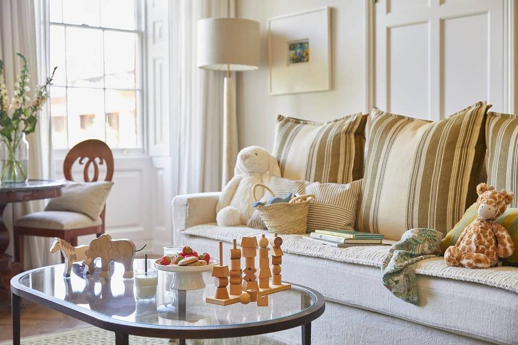 A snapshot of a bedroom suite, featuring lots of amenities for young children