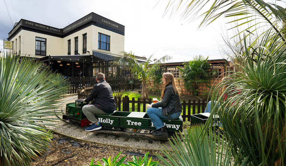 This Local London Pub Is Home To A Huge Tropical Beer Garden – And You Can Ride Through It On A Miniature Railway
