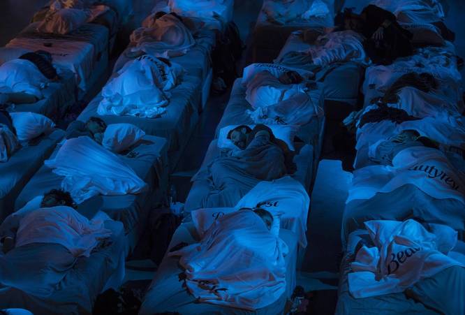 People in NYC attending SLEEP by Max Richter
