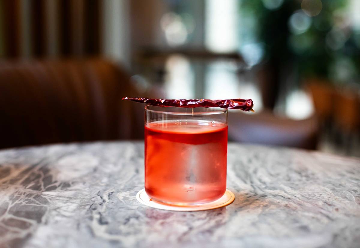 Cocktail from Fazenda with dried chilli as a garnish.