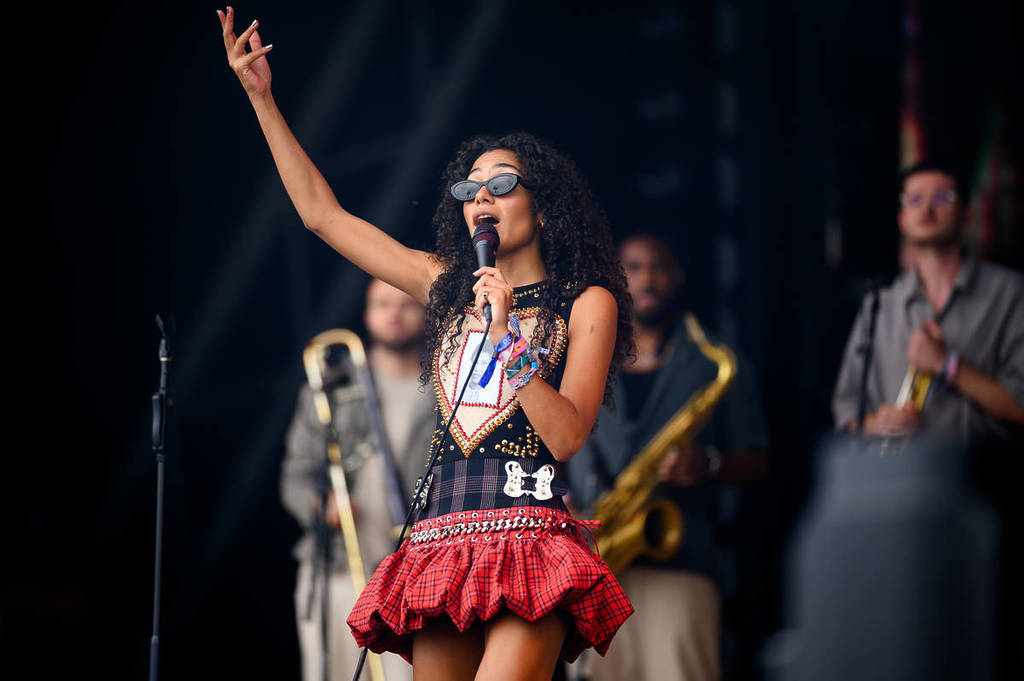 Olivia Dean on stage at Glastonbury in 2024
