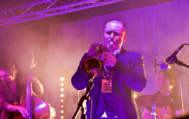 a jazz musician playing the trumpet
