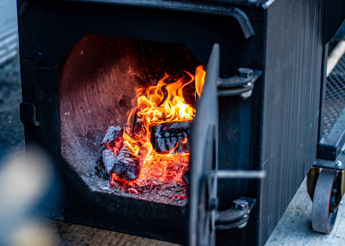 a roaring fire in a smoker
