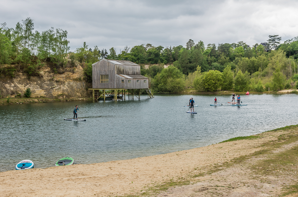 People paddleboarding on Buckland Park Lake