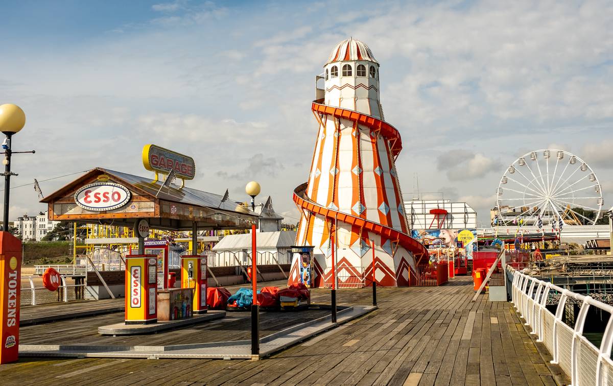 Clacton-on-Sea, Essex, UK – March 20 2024. Funfair rides and games on Clacton pier