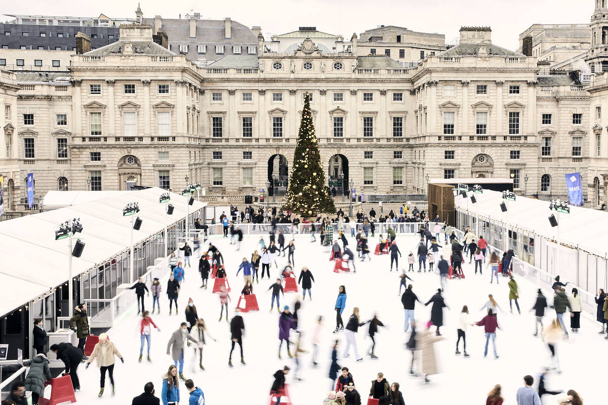People ice skating in fron of Somerset House