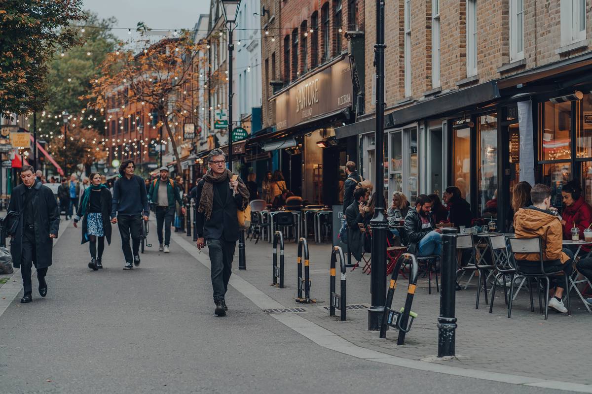 People walking through a side street n Islington