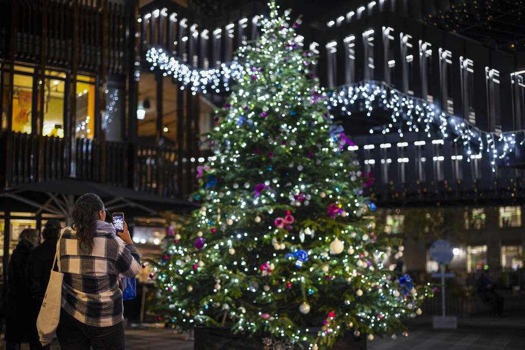 a colourful christmas tree in camden market
