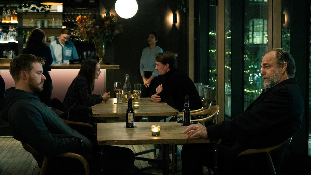 River Cartwright and Frank Harkness face off in the Lighterman Pub in Slow Horses