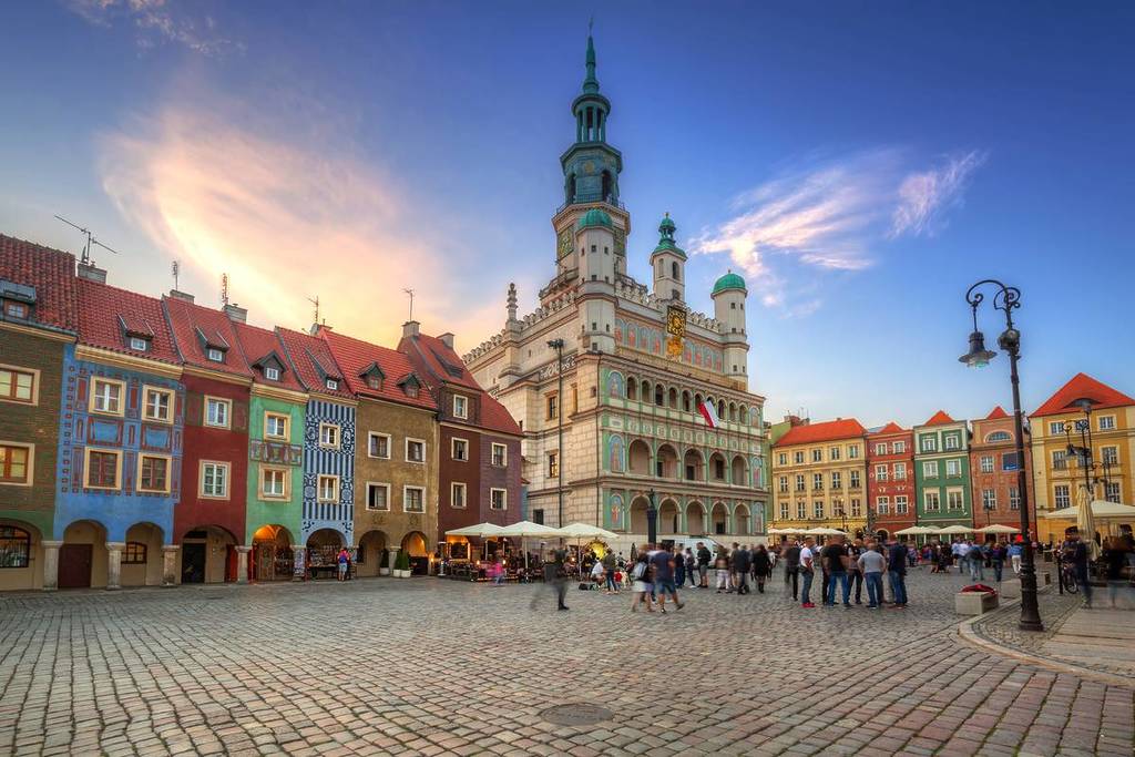 The main square in Poznan, Poand with a big church and colourful houses