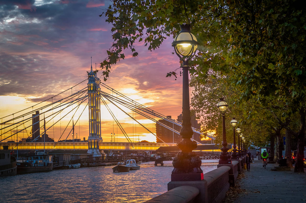 The Albert Bridge in Chelsea as seen with a pink sky at dusk
