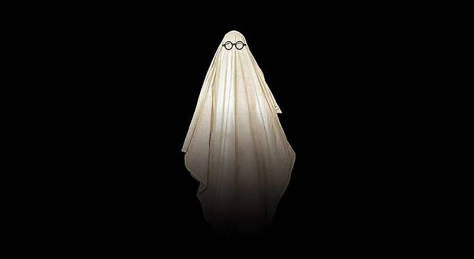 A person in a ghost costume with glasses, against a black background
