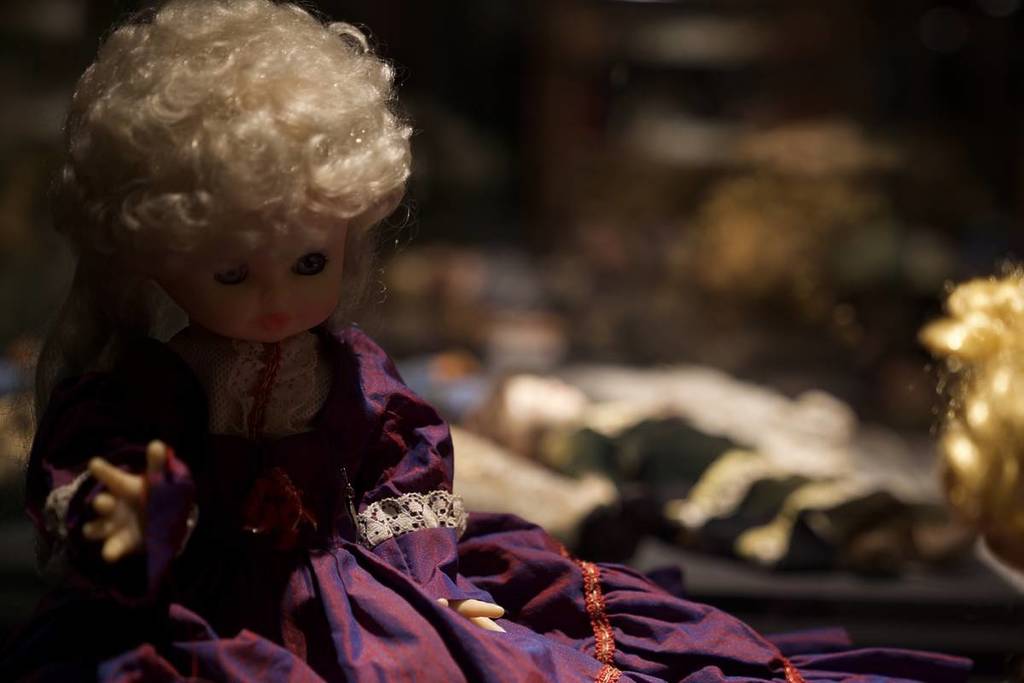 cursed doll from Dark Secrets exhibition