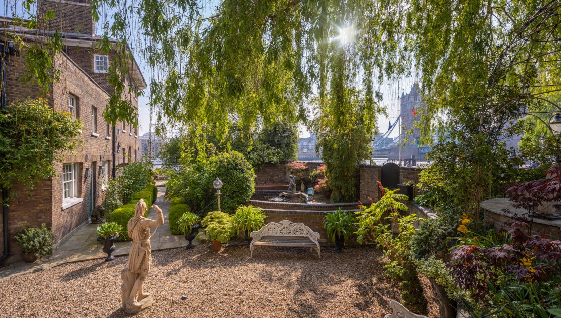 The front garden of a riverside property boasting amazing views of the city of London