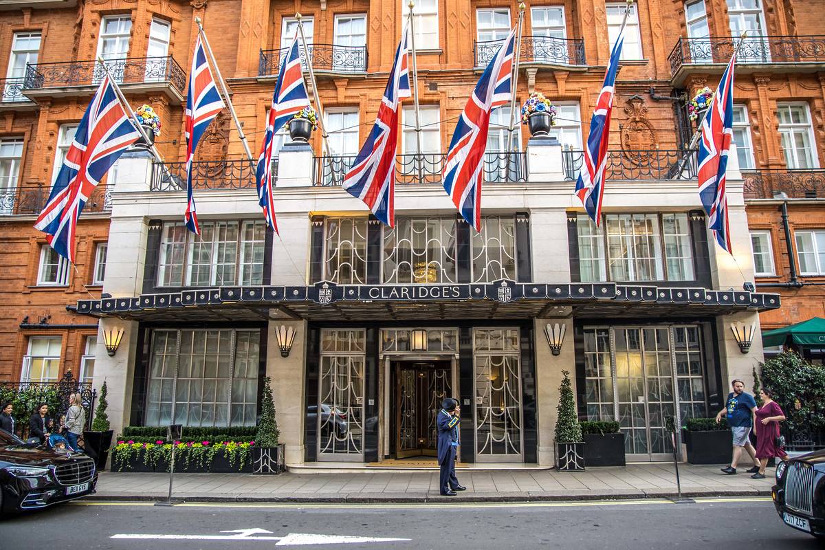 A doorman stood outside the front entrance of Claridge's hotel