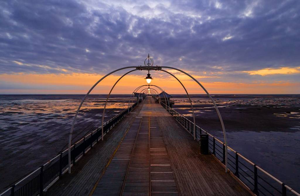Southport, Merseyside, UK, June 24, 2024; Aerial view of Southport Pier with Stunning Sunset, Southport Merseyside