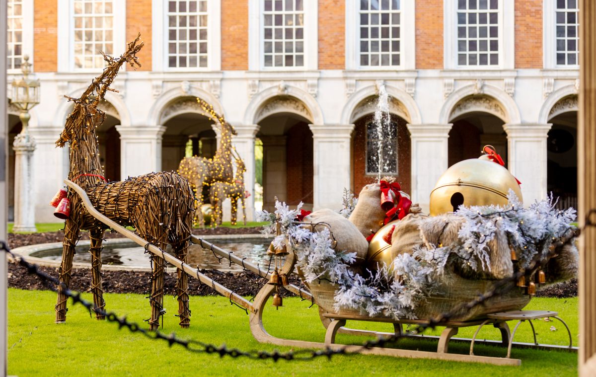 A Reindeer and a sleigh in the garden of Hampton Court Palace