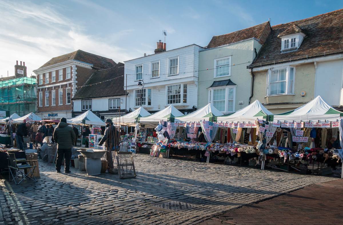 Faversham, Kent, UK, November 2019 - Market stalls in the medieval market town of Faversham, Kent, UK