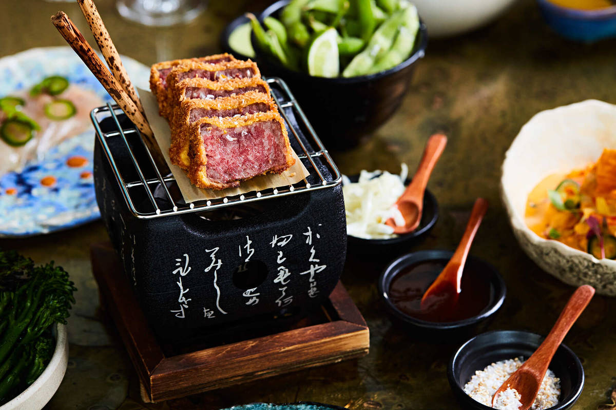 kobe beef on a tiny grill on a table