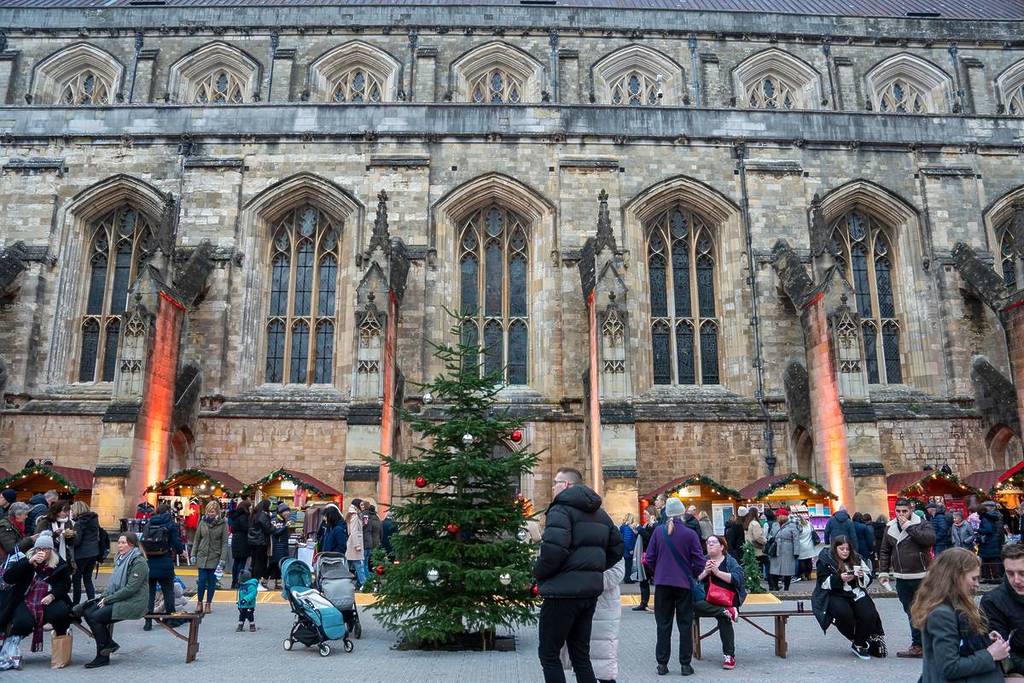 Winchester town Hampshire United Kingdom on December 2, 2022. Christmas market at the cathedral gardens.