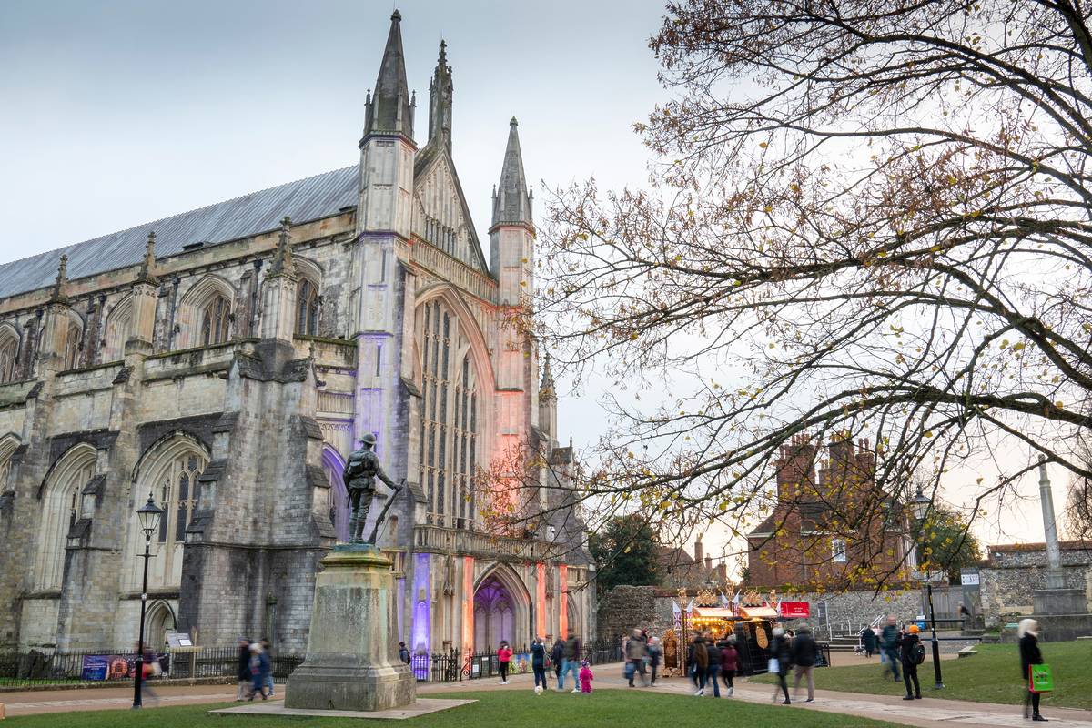 Winchester town Hampshire United Kingdom on December 2, 2022. Christmas market at the cathedral gardens.