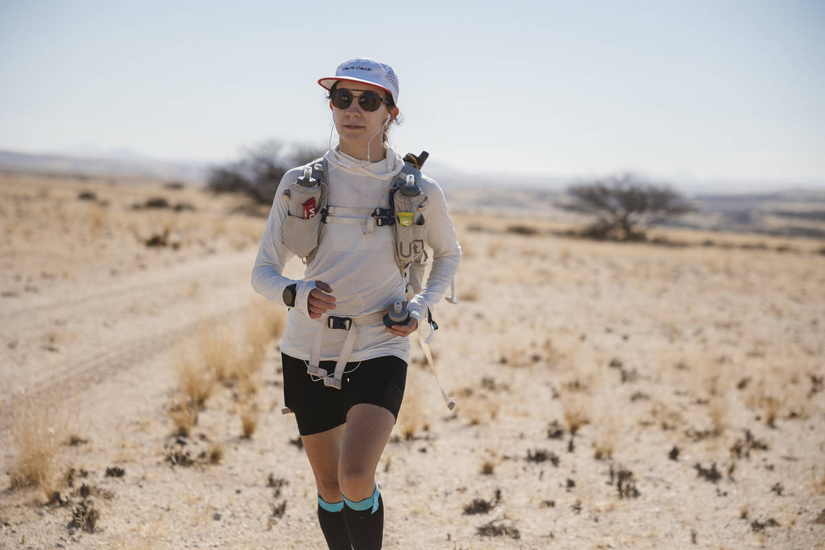 runner Ioana Barbu running through the Namibian desert as part of an ultra running marathon