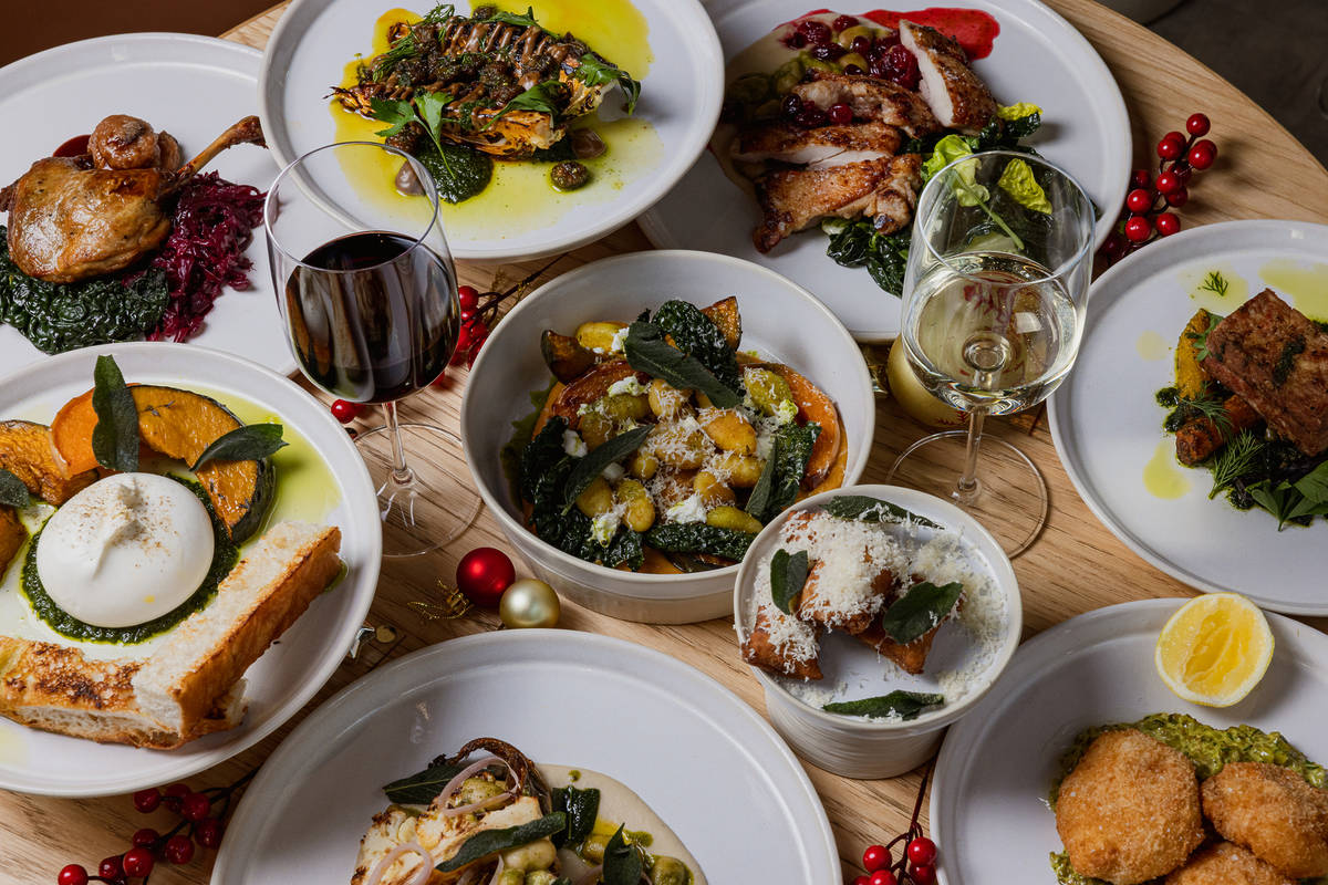 a table absolutely packed with dishes from the orangery's christmas menus - ranging from roast veggies to roast duck, and more