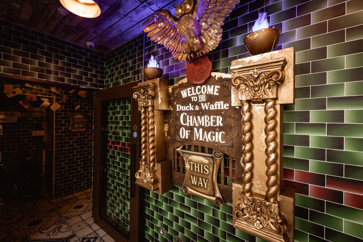 A sign welcoming guests to the Chamber of Magic at Duck & Waffle