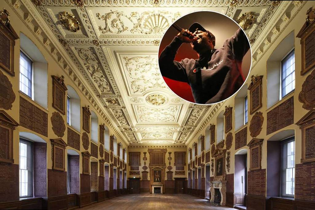 The Great Hall at Barts North Wing in London and a rapper performing on stage holding a microphone