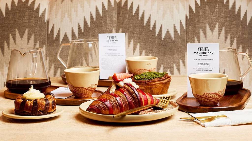 Selection of pastries and coffees from Qima Café in Covent Garden, London.