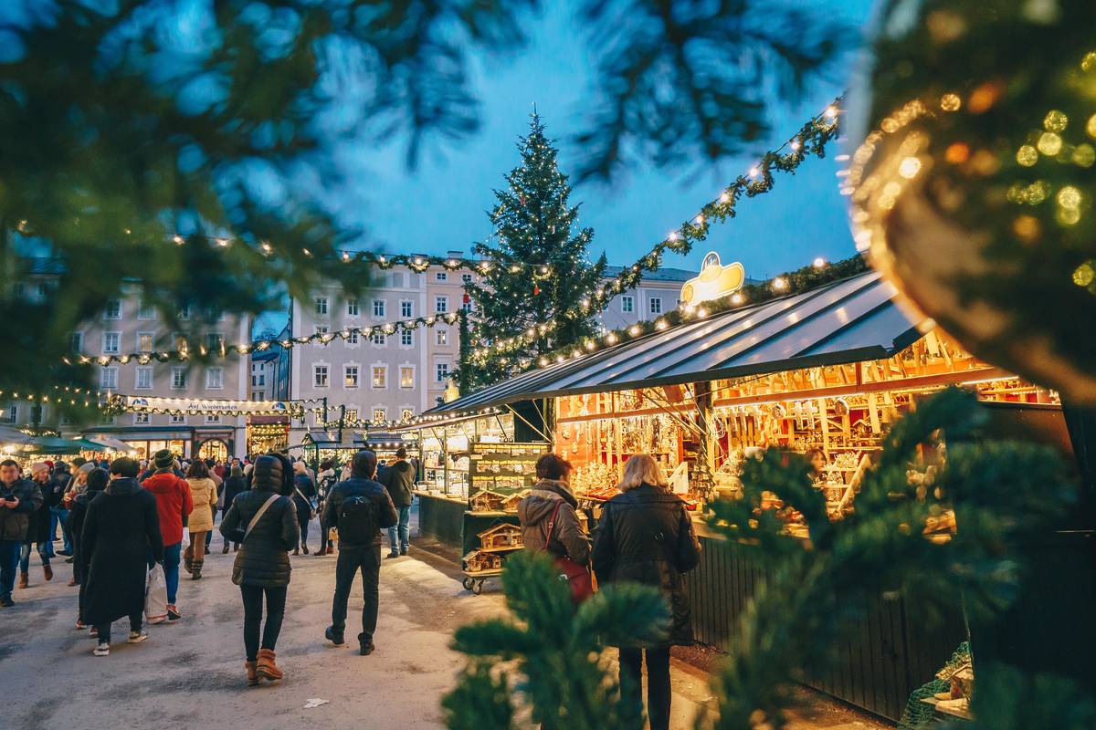 People wandering through the Salzburg Christmas market