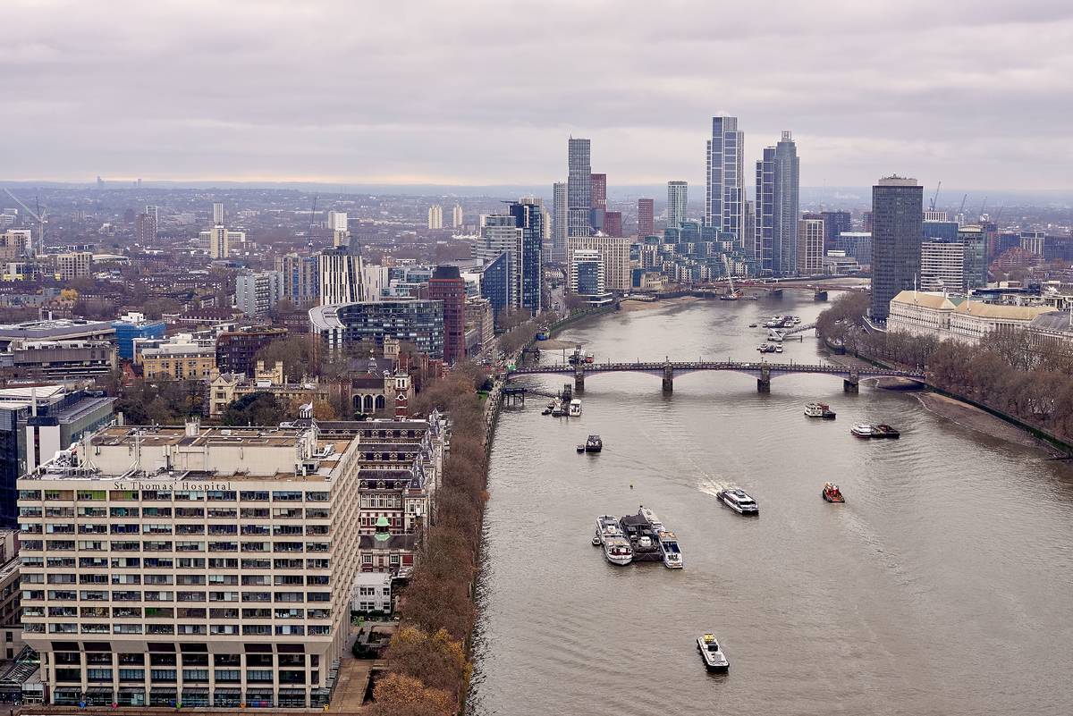 A view across the River Thames with Lambeth and Vauxhall in the distance