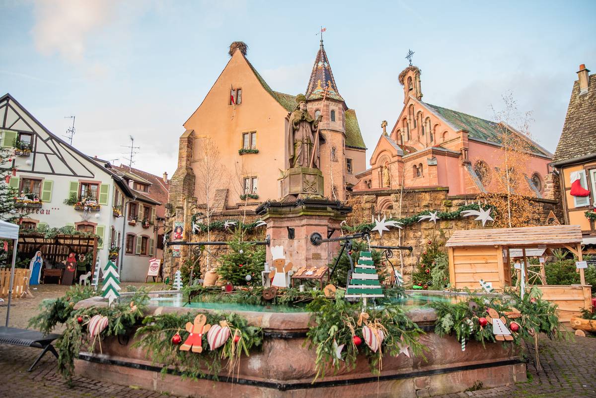 Eguisheim, Alsace, France - December 19 2020: Christmas Market in Eguisheim France. Christmas decorations in the street