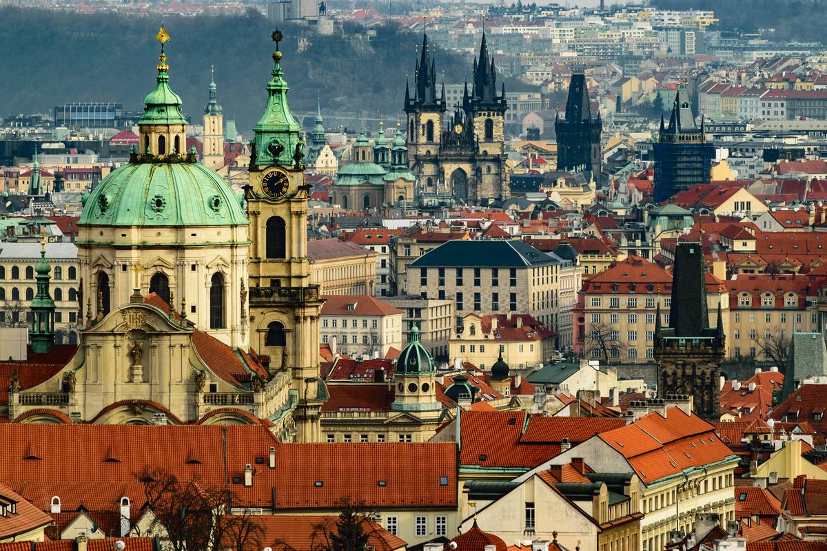 A Panoramic view of lots of historic buildings in Prague